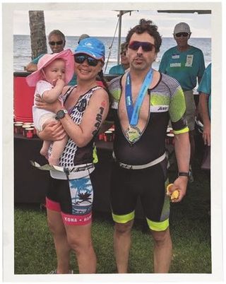 nicole shanahan and sergey brin with their daughter at an ironman race