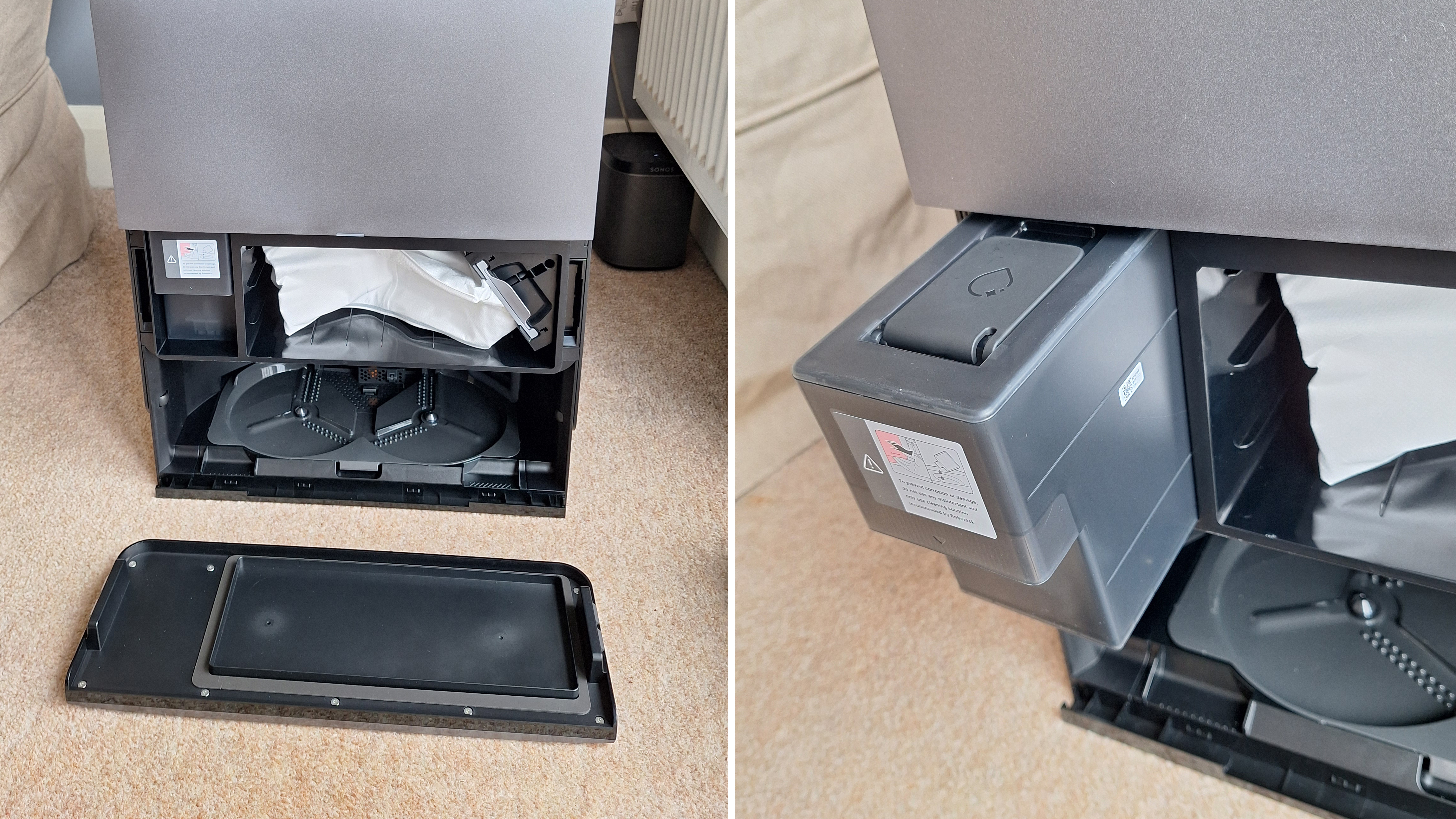 Roborock Saros 20 robot vacuum dock with front cover removed to show dust bag and floor cleaner dispenser