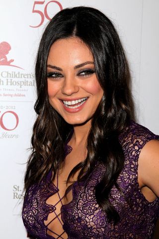 Mila Kunis at the 50th Anniversary of St Jude Childrens Research Hospital Benefit Gala