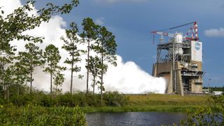 A plume of smoke generated by the RS-25 engine during a hot fire test at NASA Stennis Space Center.