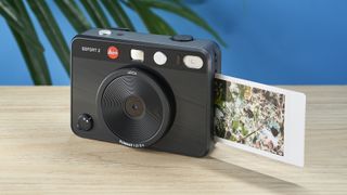 A black Leica Sofort 2 hybrid instant camera