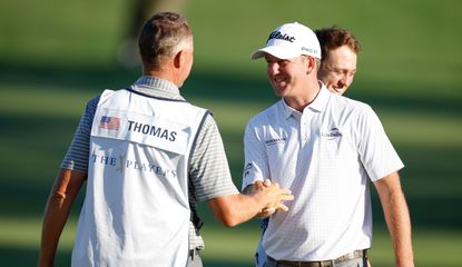 Hoge shakes hand with Justin Thomas' caddie