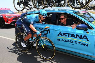 ETNA PIAZZALE RIFUGIO SAPIENZA ITALY MAY 10 LR Miguel ngel Lpez Moreno of Colombia and Team Astana Qazaqstan talks with Aleksandr Vinokrov of Kazakhstan team Team manager prior to abandon the race during the 105th Giro dItalia 2022 Stage 4 a 172km stage from Avola to Etna Piazzale Rifugio Sapienza 1899m Giro WorldTour on May 10 2022 in Etna Piazzale Rifugio Sapienza Italy Photo by Tim de WaeleGetty Images
