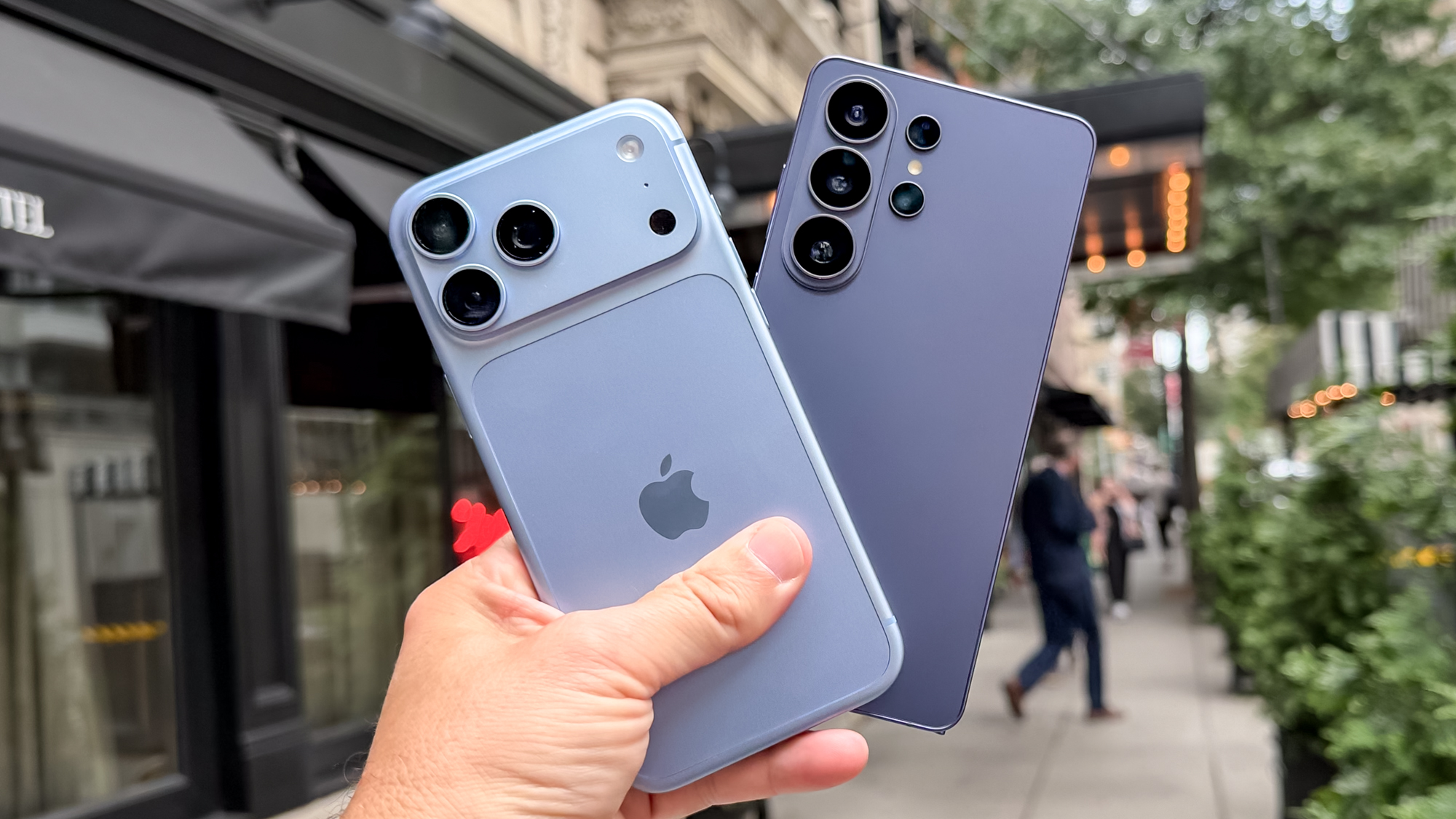 iPhone 18 Pro Max and Galaxy S26 Ultra in hand