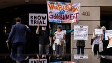 Protesters outside hearing to charge former FBI Director James Comey