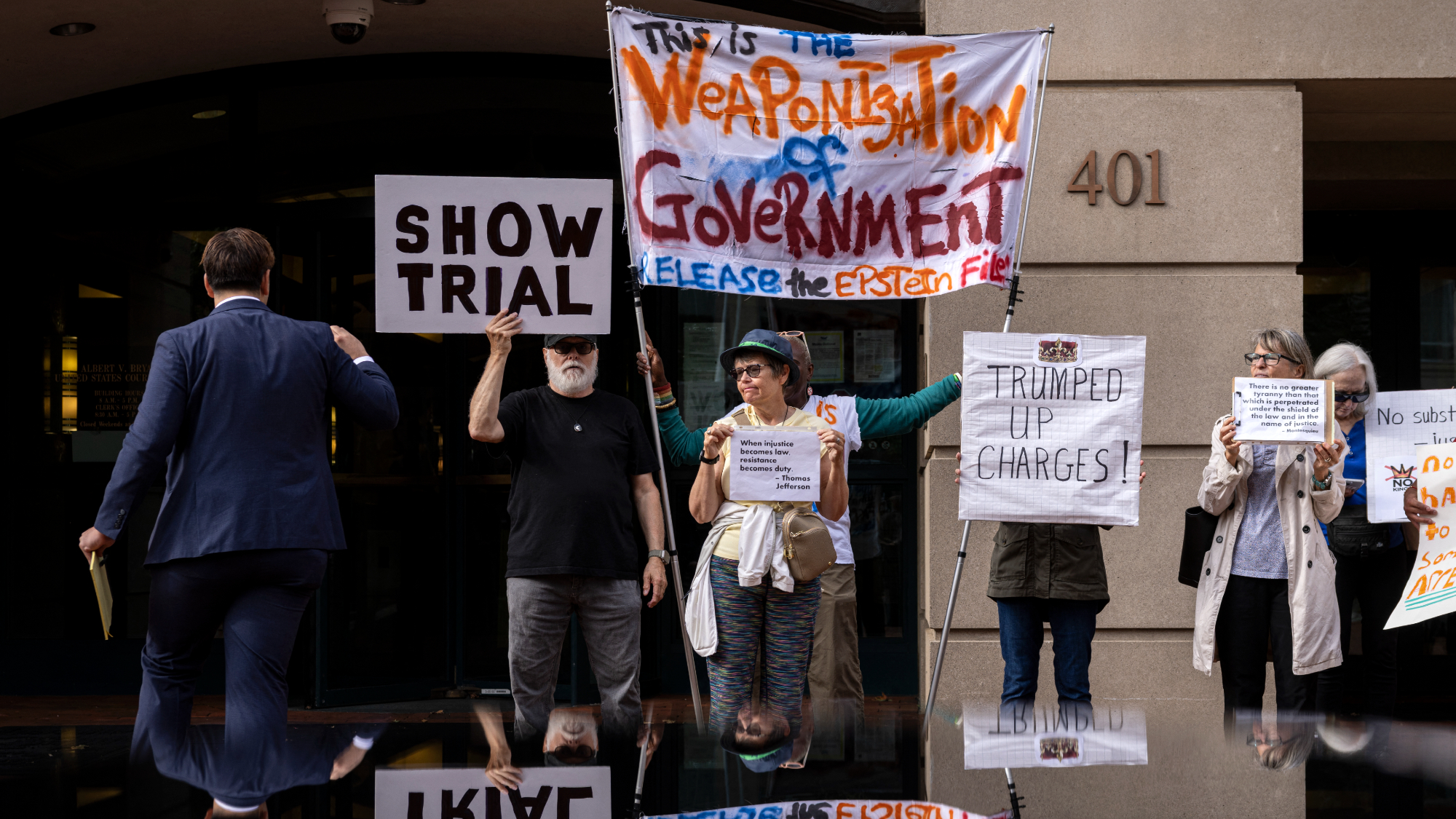 Protesters outside hearing to charge former FBI Director James Comey