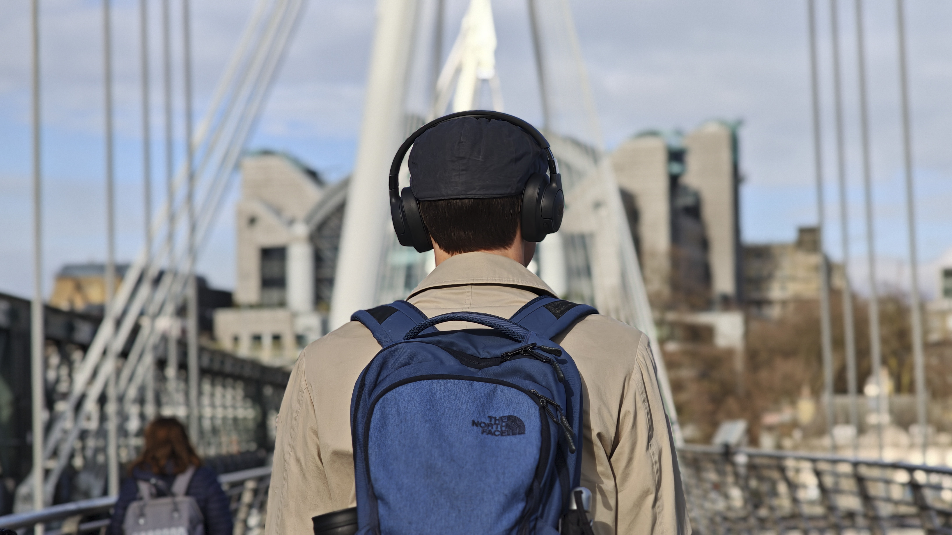 Xiaomi 15 Ultra sample photos, person in London street with headphones on