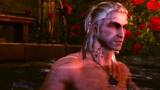 Geralt, with a tattoo of a naked lady holding a sword on his neck, takes a bath