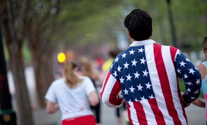 Runners take part in an organized moment of silence and memorial run for the victims of the Boston Marathon, in Atlanta, April 16.