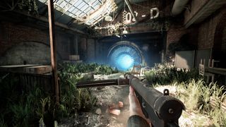 Industria - the character holding a Sten gun looks at a portal inside a ruined warehouse