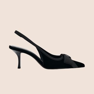 flat lay image of black heels