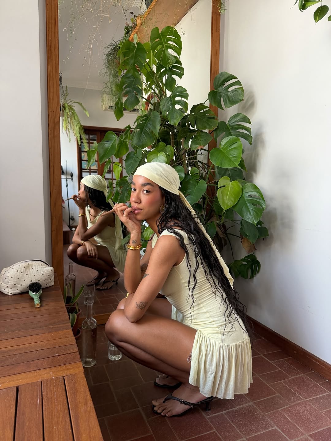 Amaka Hamelijnck with knotless braids and mauve-toned blush