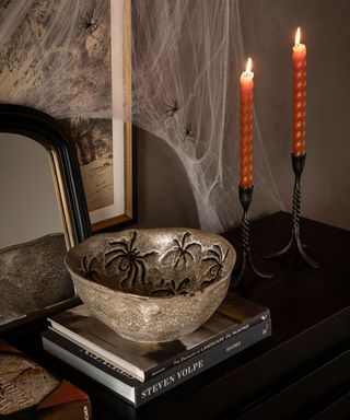 Halloween decorations on side table
