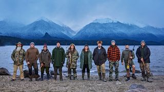 10 contestants from 'Alone Australia' season 2 lined up in front of New Zealand mountains