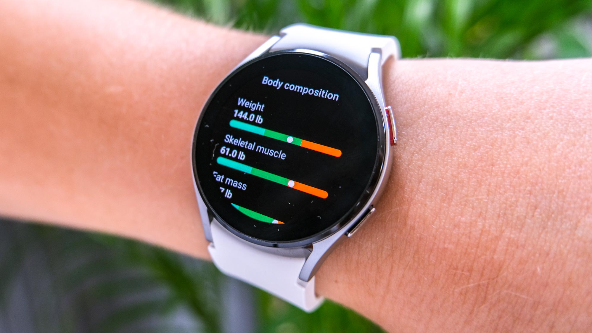 Samsung Galaxy Watch 4 on a wrist, showing body composition analysis
