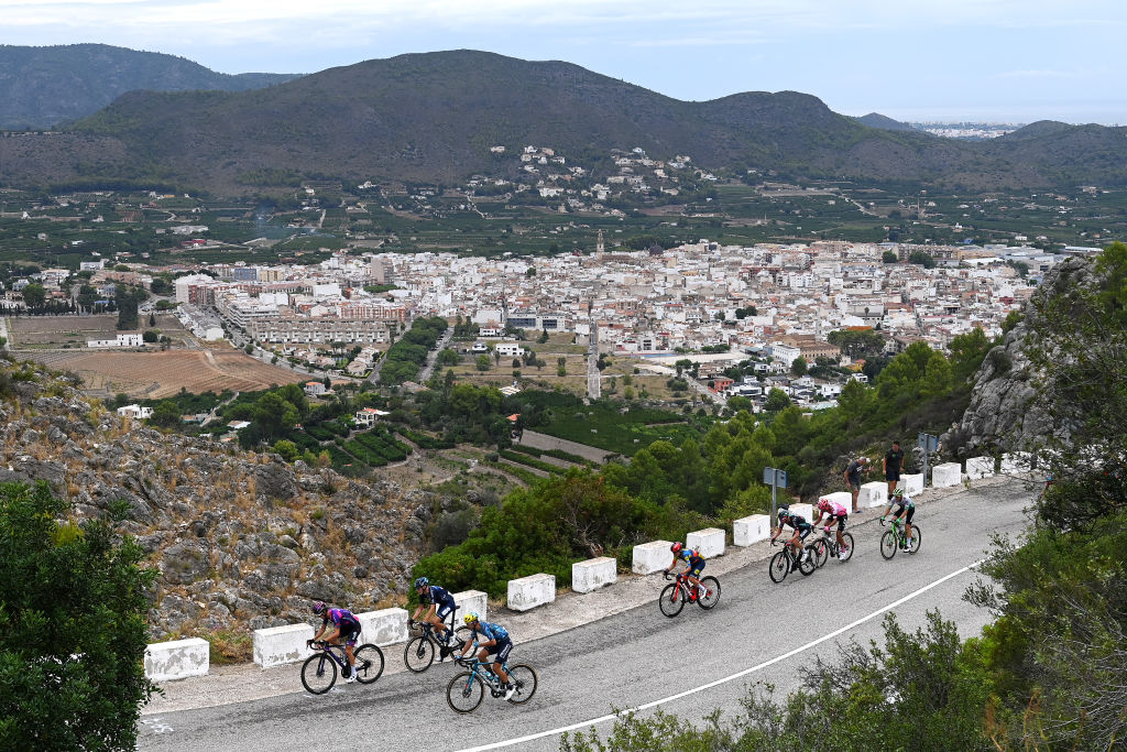 XORRET DE CAT COSTA BLANCA INTERIOR SPAIN SEPTEMBER 02 LR Pelayo Sanchez Mayo of Spain and Team BurgosBH Max Poole of The United Kingdom and Team DSM firmenich Samuele Battistella of Italy and Astana Qazaqstan Team Kenny Elissonde of France and Team Lidl Trek and a general view of the breakaway climbing to the Alto de Vall dEbo 537m during the 78th Tour of Spain 2023 Stage 8 a 165km stage from Dnia to Xorret de Cat Costa Blanca Interior 905m UCIWT on September 02 2023 in Xorret de Cat Costa Blanca Interior Spain Photo by Tim de WaeleGetty Images