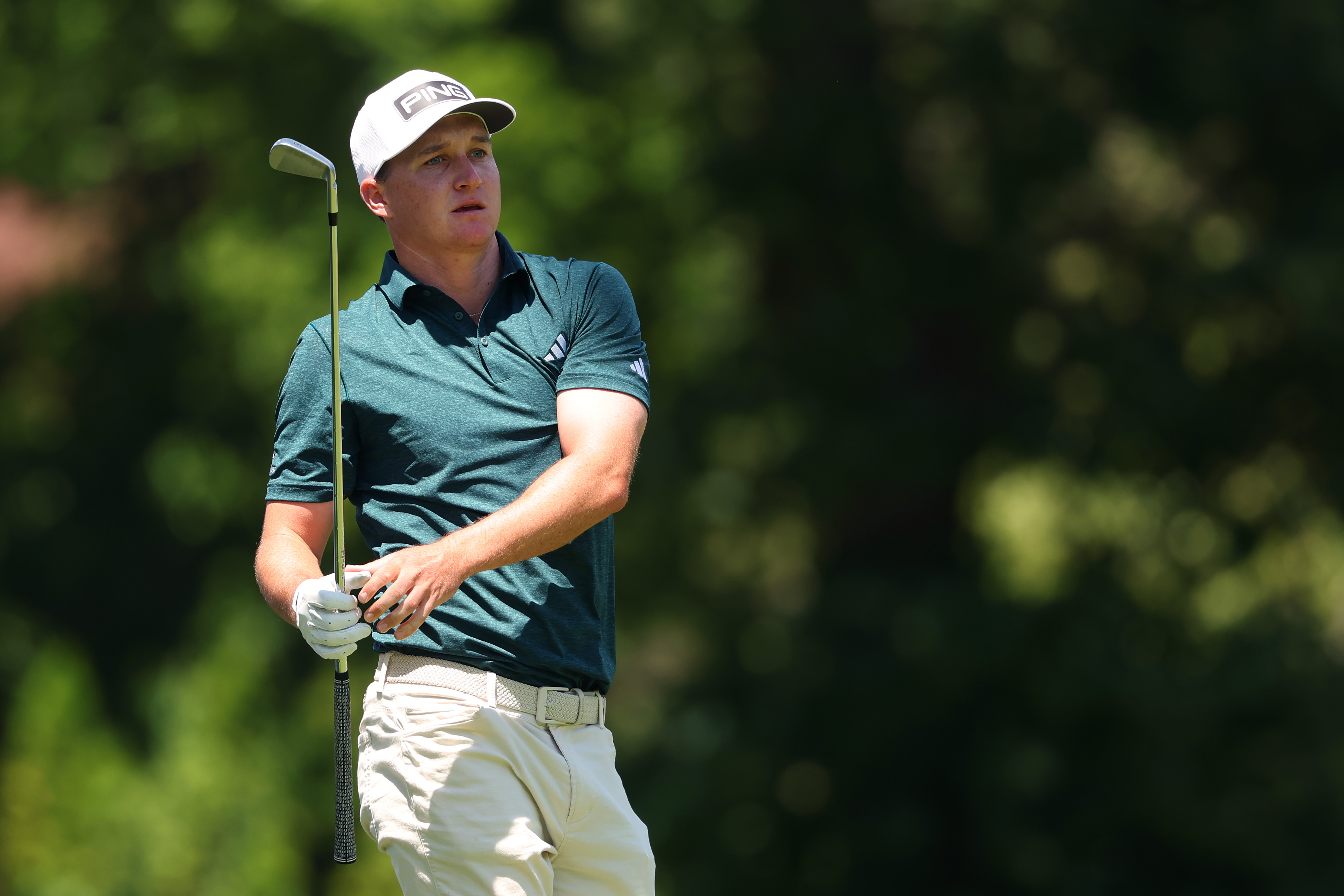 Matt McCarty hits a shot with an iron