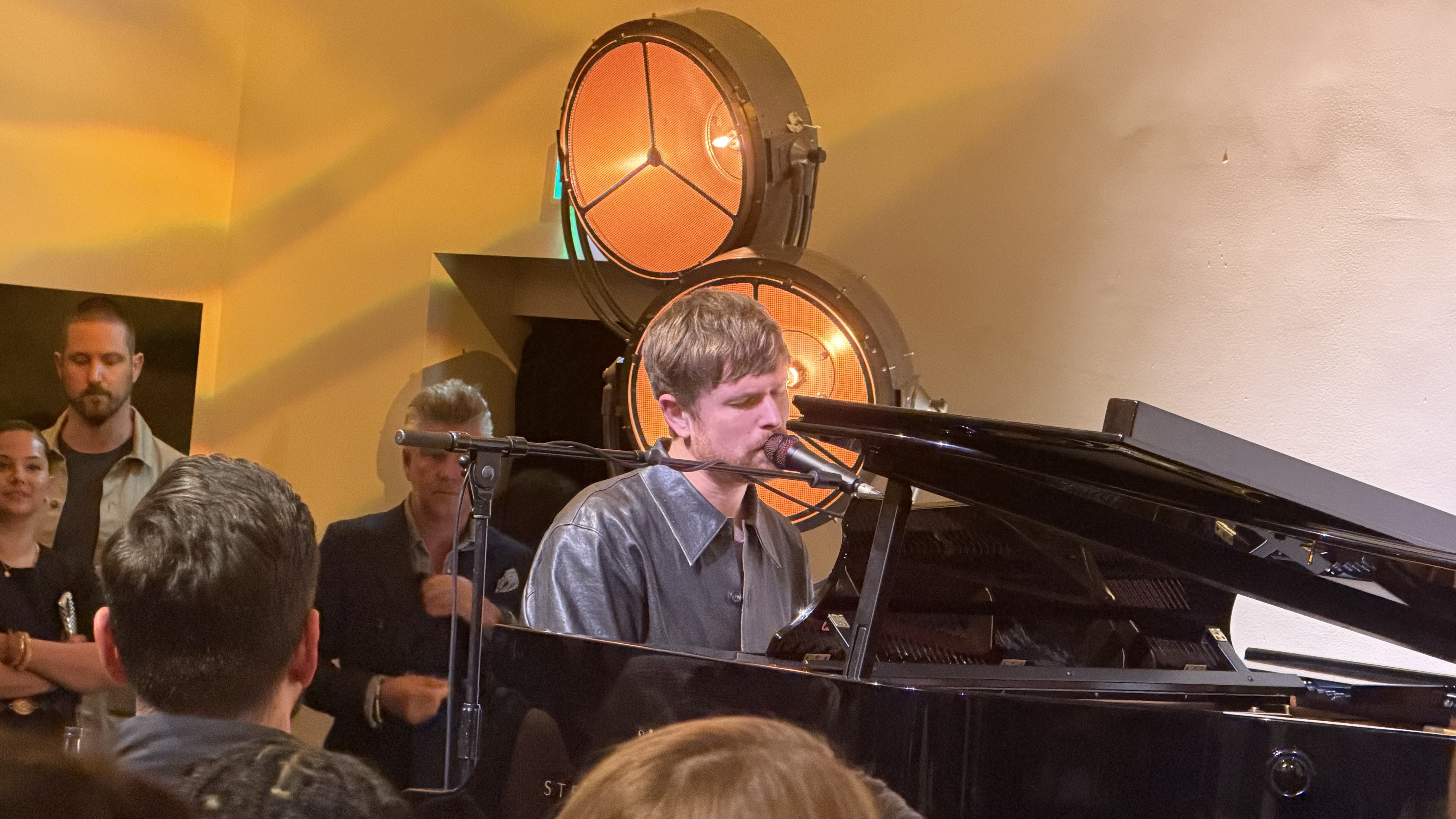 Musician James Blake playing piano