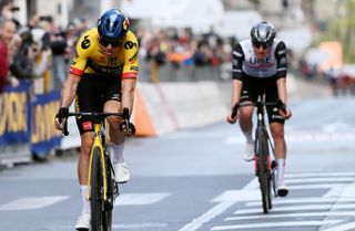 SANREMO, ITALY - MARCH 18: Wout Van Aert of Belgium and Team Jumbo â€“ Visma crosses the finish line in third place during the 114th Milano-Sanremo 2023 a 294km one day race from Abbiategrasso to Sanremo / #MilanoSanremo / #UCIWT / on March 18, 2023 in Sanremo, Italy. (Photo by Tim de Waele/Getty Images)