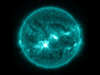 NASA's Solar Dynamics Observatory spacecraft captured this image on the sun of an M9.4-class solar flare, which peaked at 8:30 pm EDT on Oct. 23, 2013. The image displays light in the wavelength of 131 Angstroms, which is good for viewing the intense heat of a solar flare and typically colored teal.