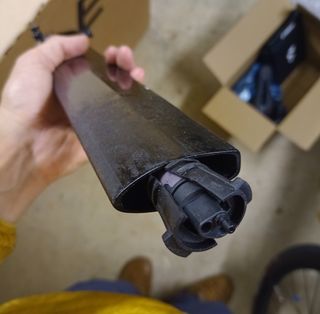 A Di2 battery rammed up a seatpost