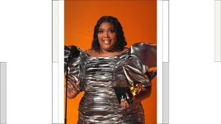 Lizzo wears a silver ruffled dress as she accepts Record Of The Year for “About Damn Time” onstage during the 65th GRAMMY Awards at Crypto.com Arena on February 05, 2023 in Los Angeles, California