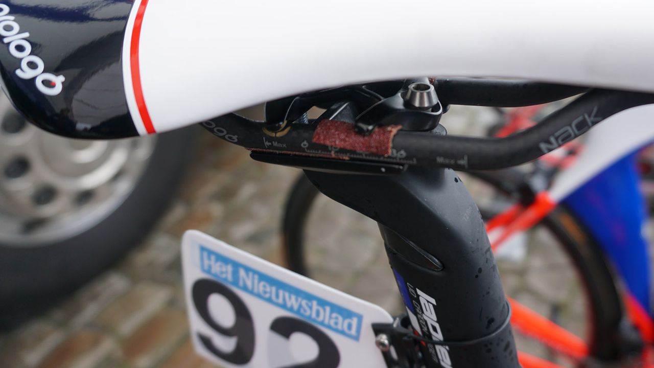 Davide Cimolai (Groupama-FDJ) adds grip tape to his seat rails to prevent any slipping on the cobbles