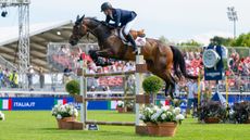 Tim Gredley and Medoc De Toxandria in action for Great Britain at the European Championships in Milan, Italy