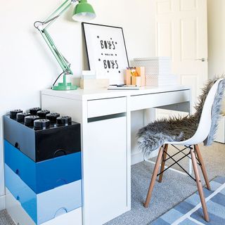 kids room with white desk and LEGO storage unit