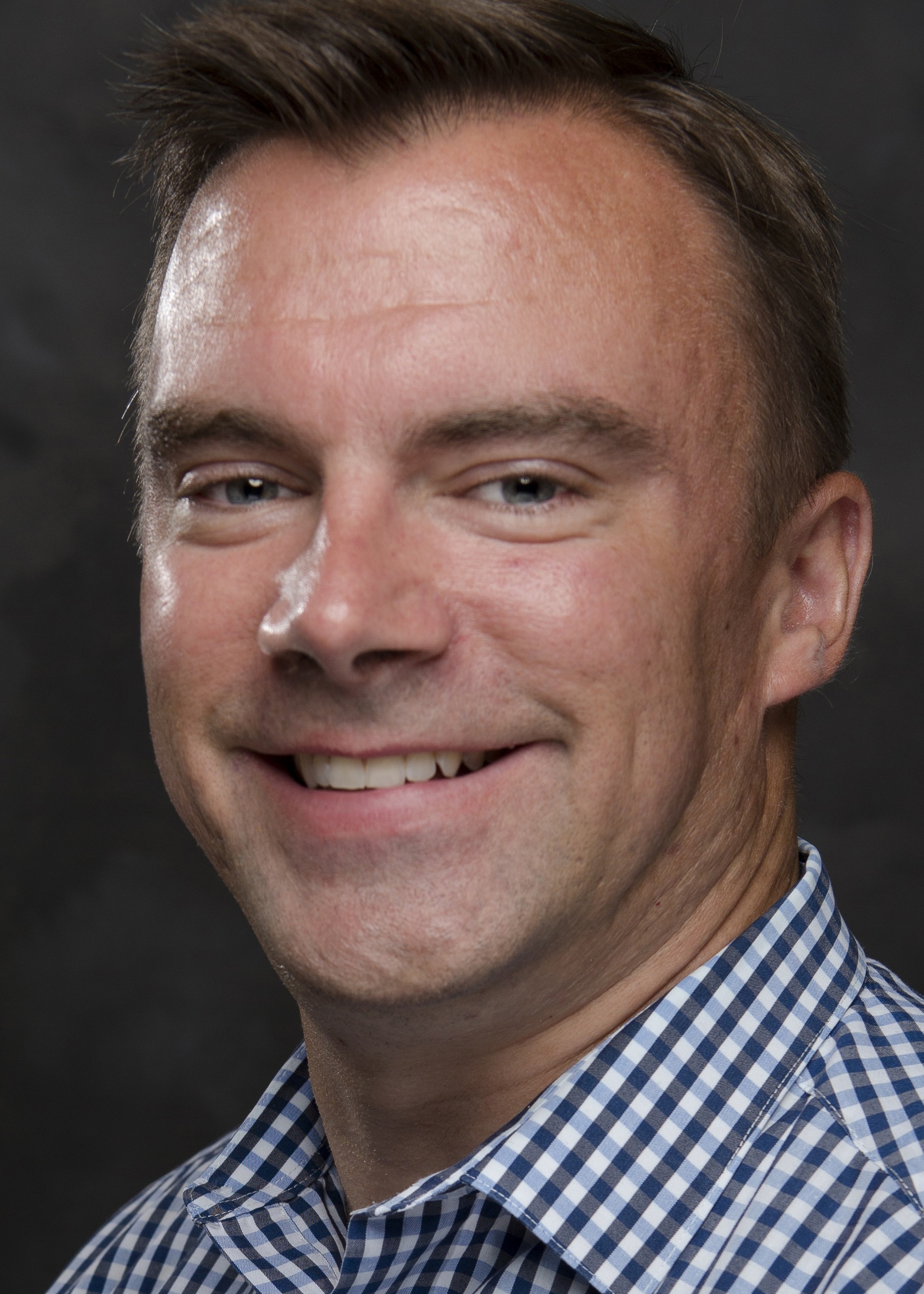 Smiling headshot of Sean Bowman.