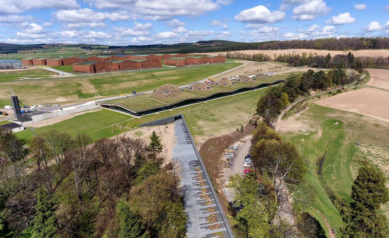 Birdseye view of fields &amp; buildings