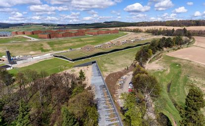 Birdseye view of fields & buildings