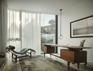 Twin Peaks Residences' dream home office with semi transparent curtains