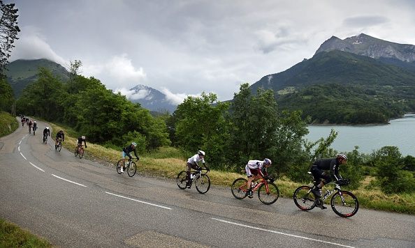 The riders head downhill
