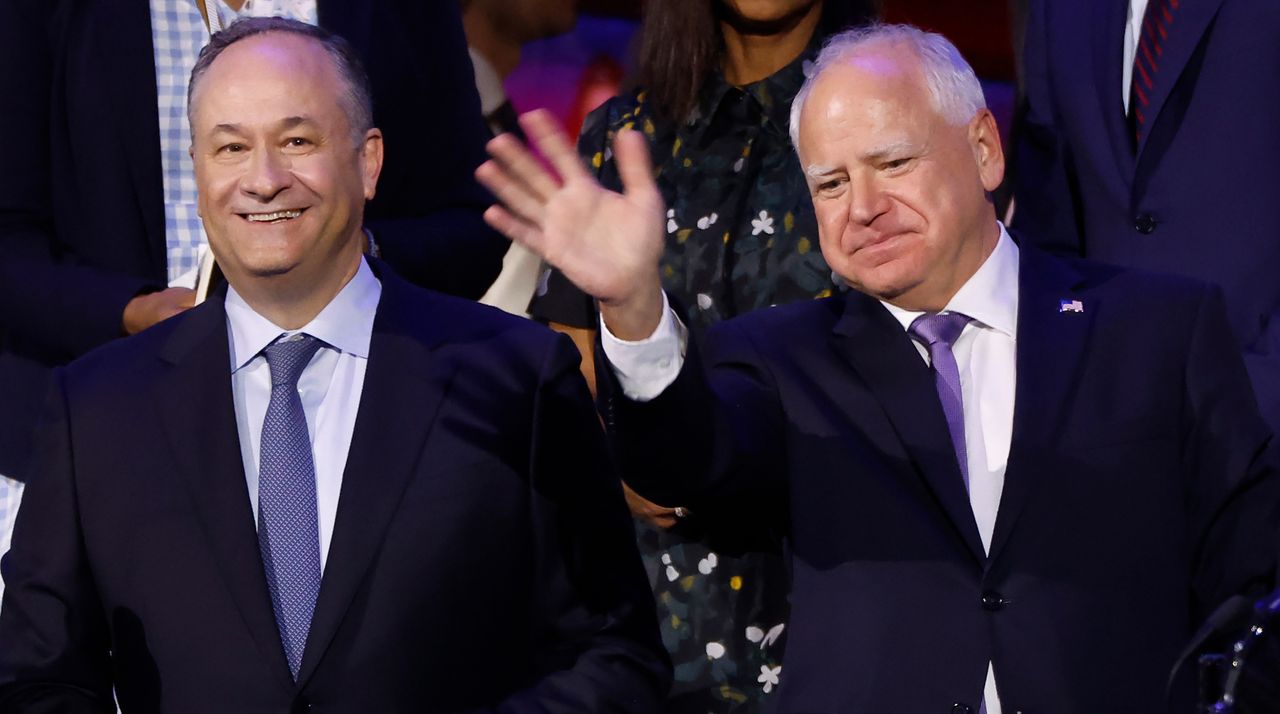  Second Gentleman Doug Emhoff and Democratic vice presidential candidate Minnesota Gov. Tim Walz during the first day of the Democratic National Convention at the United Center on August 19, 2024 in Chicago, Illinois.