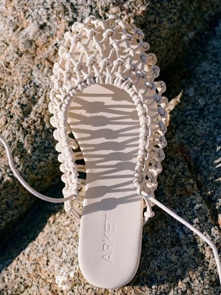 One Arket woven shoe on rock