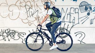 Man riding the new Pure Flux One electric bike