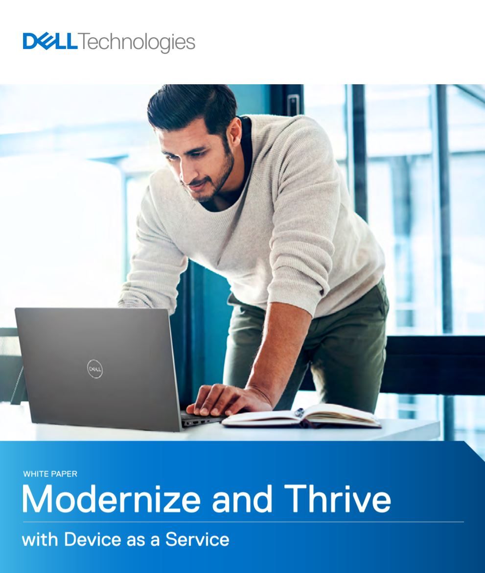 Whitepaper cover with man leant over a laptop on a desk