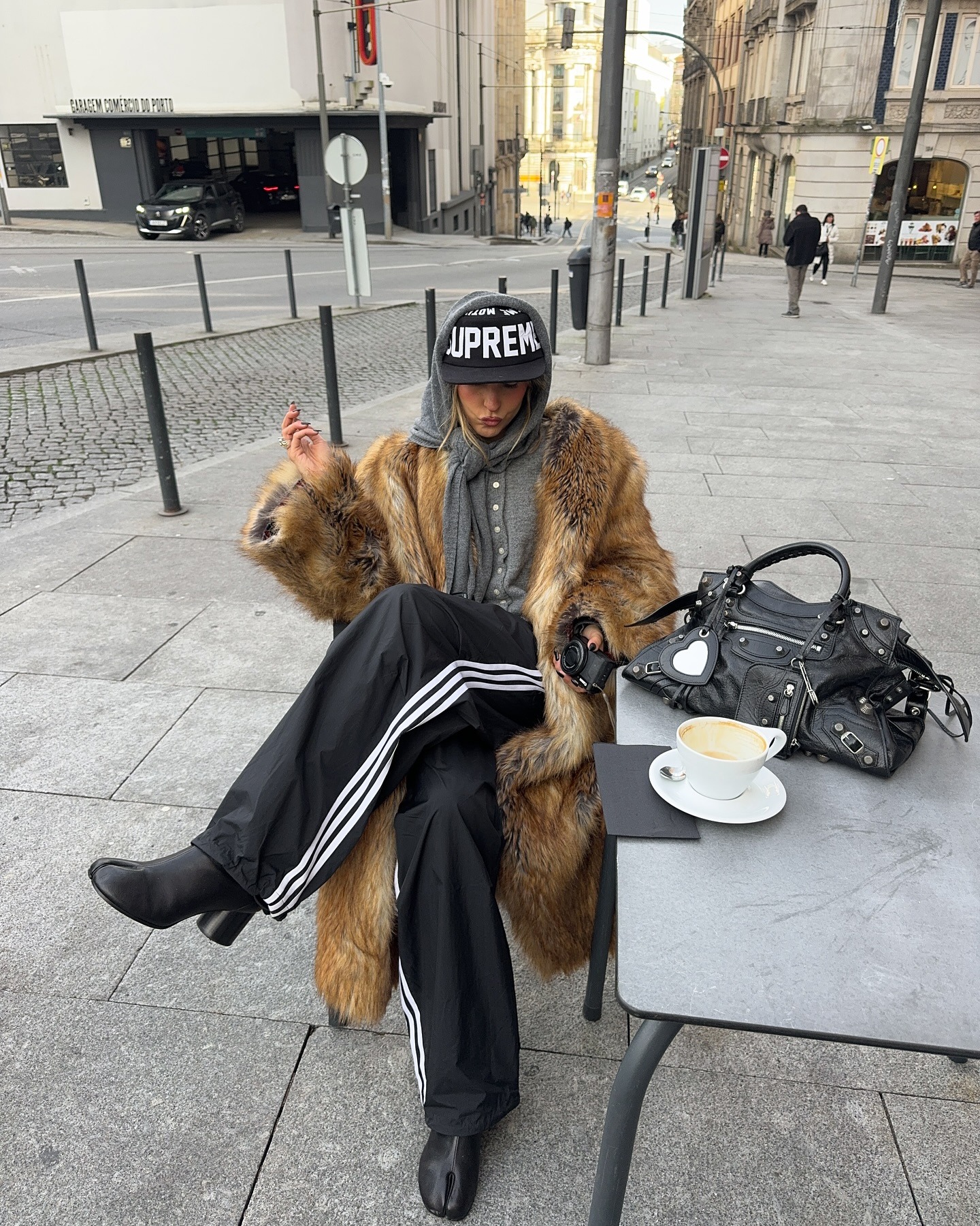 Fashion person Sofia Mcoelho wears a faux fur jacket outfit.