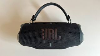The JBL Charge 6 shown from the front, including its carry handle