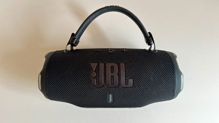 The JBL Charge 6 shown from the front, including its carry handle