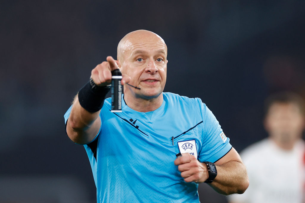 Referee Szymon Marciniak gestures during the UEFA Europa League 2023/24 Quarter-Final second leg match between AS Roma and AC Milan at Stadio Olimpico on April 18, 2024 in Rome, Italy. (Photo by Matteo Ciambelli/DeFodi Images via Getty Images)