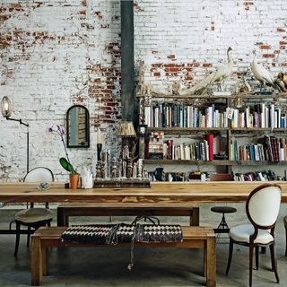 warehouse with brick wall and books on shelf