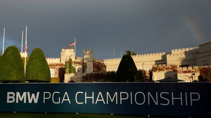 The flag half mast and clubhouse at Wentworth