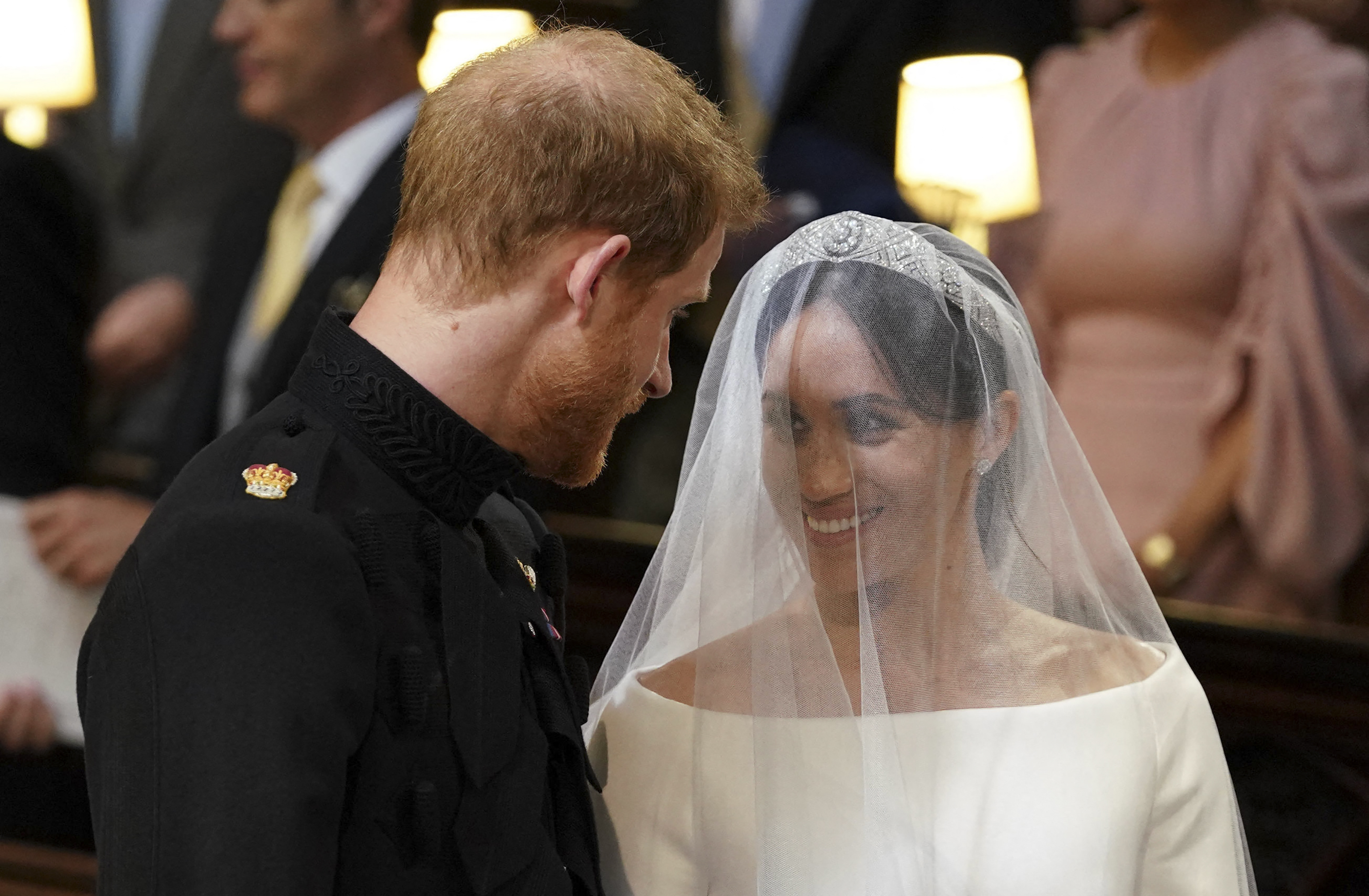 Prince Harry and Meghan Markle at their royal wedding in St. George's Chapel at Windsor Castle on May 19, 2018