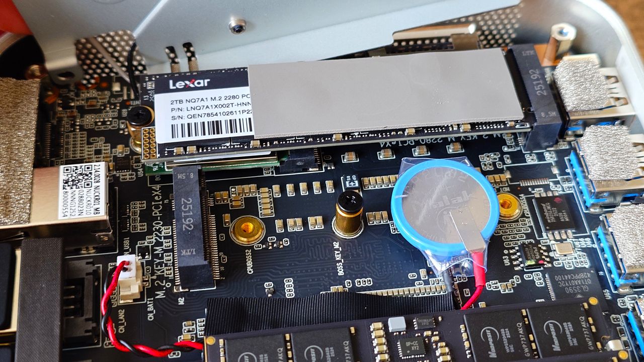 Internals of the Geekom A9 Max mini PC showing upgradeable RAM and a vacant m.2 2230 SSD slot.