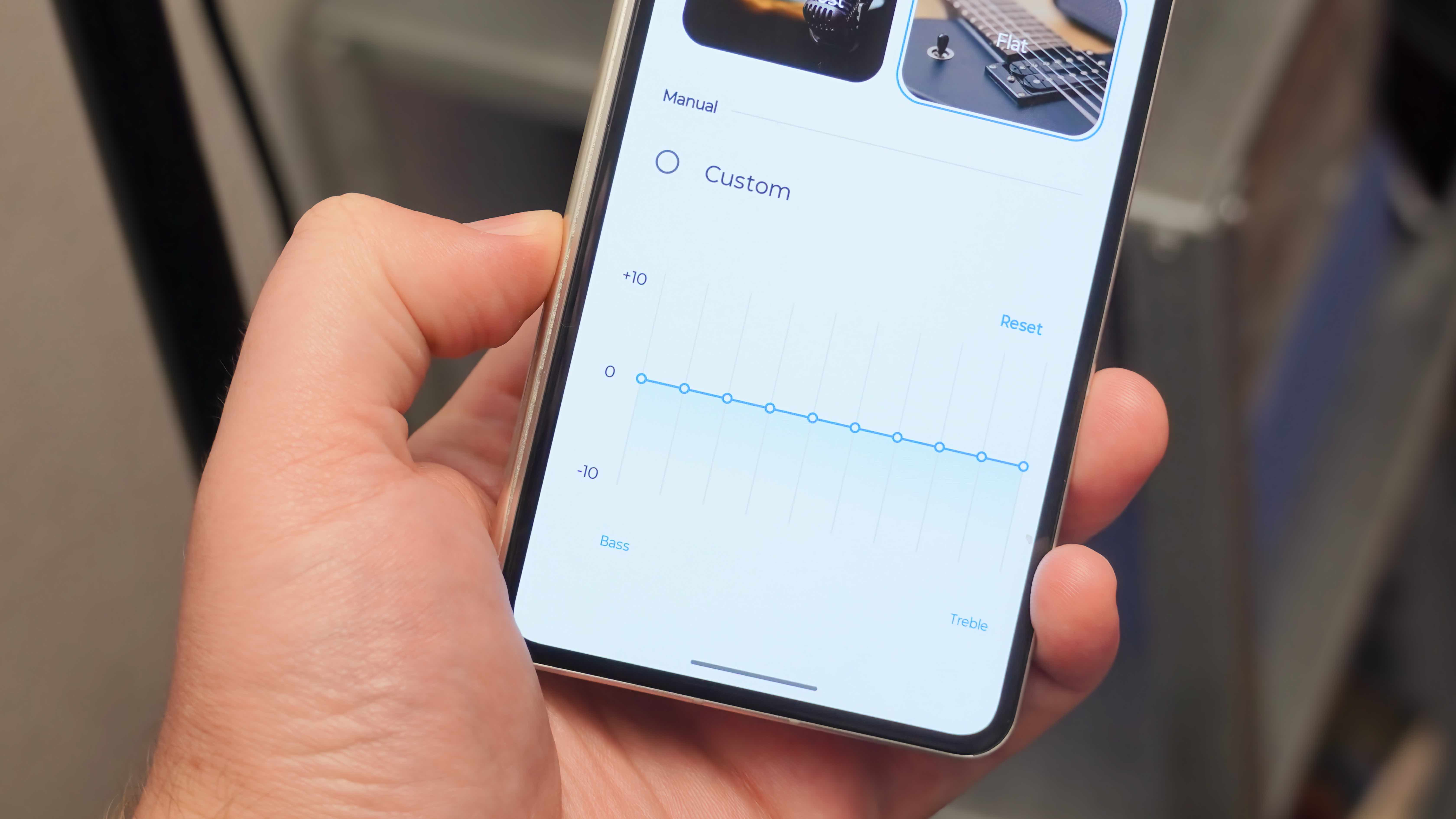 The Moto Buds 2 Plus alongside their companion app showing settings to change to improve audio quality.