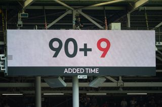The scoreboard shows that there is 9 added minutes of stoppage time during the Premier League match between Fulham FC and Brentford FC at Craven Cottage on August 19, 2023 in London, England. (Photo by Visionhaus/Getty Images)