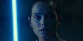 Star Wars: The Rise of Skywalker a somber Rey in the glow of her lightsaber