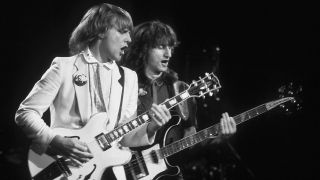 OAKLAND, CA - JUNE 6: Alex Lifeson and Geddy Lee perform with their band 'Rush' during the Moving Pictures tour. They are performing at the Oakland-Alameda County Coliseum Arena on June 6, 1981. (Photo by Larry Hulst/Michael Ochs Archives/Getty Images)